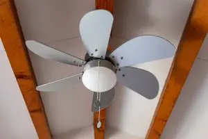 using a ceiling fan to keep a room cool during the summer